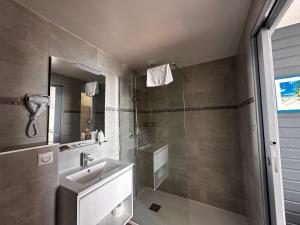 Koupelna v ubytování Hôtel A RENA D'ORU