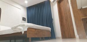 Hotel Kartiki客房内的一张或多张床位