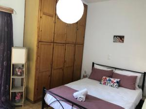 Postel nebo postele na pokoji v ubytování Σταματάκης