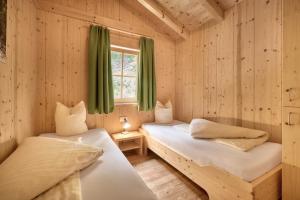 Postel nebo postele na pokoji v ubytování AREA 47 - Tirol