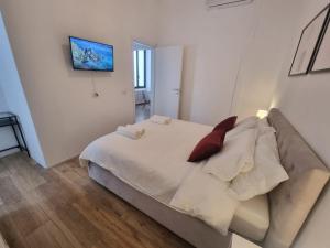 Ένα ή περισσότερα κρεβάτια σε δωμάτιο στο Lizard Hotel
