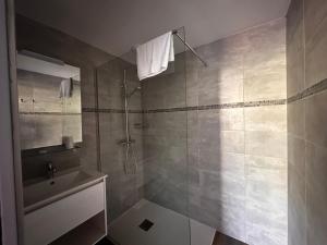 Koupelna v ubytování Hôtel A RENA D'ORU