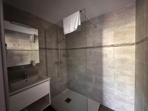 Koupelna v ubytování Hôtel A RENA D'ORU