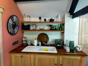 Η κουζίνα ή μικρή κουζίνα στο Villa Rosa