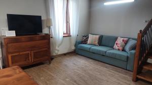 TV a/nebo společenská místnost v ubytování Casa di Chicca
