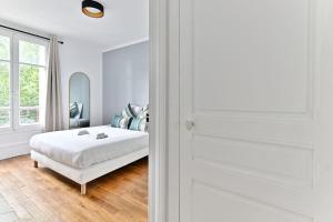 Voodi või voodid majutusasutuse Appartement Vue panoramique sur la capitale toas