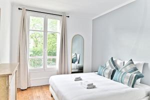 Voodi või voodid majutusasutuse Appartement Vue panoramique sur la capitale toas