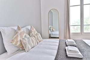 Voodi või voodid majutusasutuse Appartement Vue panoramique sur la capitale toas