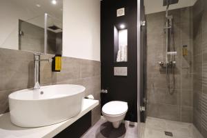 Koupelna v ubytování JustStay München Hotel & Apartments