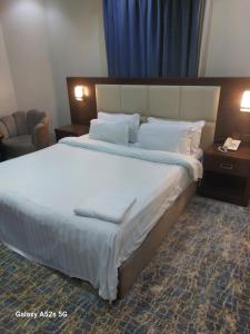 Postel nebo postele na pokoji v ubytování Hotel Berg Rappeg