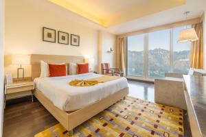 Voodi või voodid majutusasutuse The Zion Shimla toas