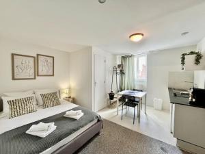 Ένα ή περισσότερα κρεβάτια σε δωμάτιο στο Studio 4 Rue Théodore Bac - DABNB