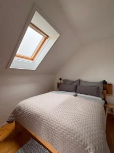 Postel nebo postele na pokoji v ubytování Ferienwohnung, nahe dem Faaker See