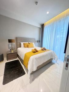 Ένα ή περισσότερα κρεβάτια σε δωμάτιο στο Mercury Tower Apt 508