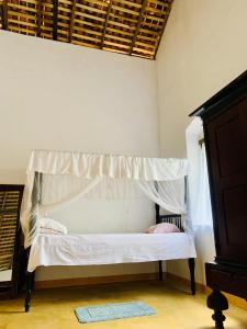 Afbeelding uit fotogalerij van Heritage Home in Kosgoda