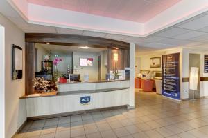 a waiting area of a pharmacy in a hospital at Ace Hotel Montlu&ccedil;on in Saint-Victor