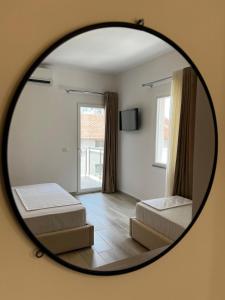 Postel nebo postele na pokoji v ubytování Helena Hotel