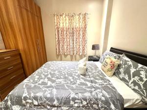 Postel nebo postele na pokoji v ubytování Matina Enclaves Residences