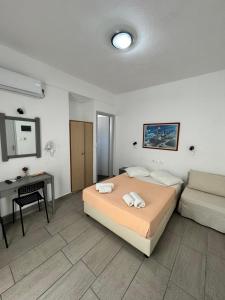 Posteľ alebo postele v izbe v ubytovaní Deep Blue Rooms & Apartments