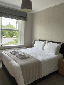 Ένα ή περισσότερα κρεβάτια σε δωμάτιο στο Braemar