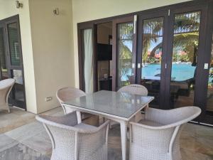 Πισίνα στο ή κοντά στο Porse Deluxe Suites by Simply-Seychelles