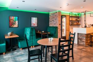 Posezení v ubytování Centrum Szkoleniowo-Konferencyjne + 37 fotografií