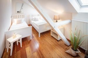 Voodi või voodid majutusasutuse Silbermöwe toas