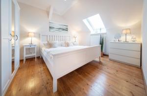 Voodi või voodid majutusasutuse Silbermöwe toas