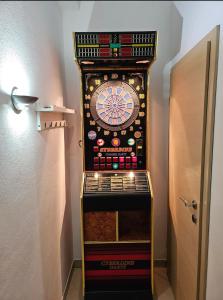 a game room with a dart board on the wall at Apartment with pool Adria in Marčana