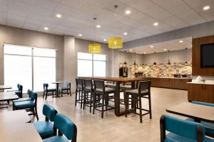 a dining room with a table and chairs at Park Inn by Radisson Florence, SC in Florence