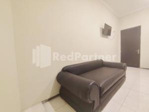 Voodi või voodid majutusasutuse Mutiara Residence Near Simpang Lima Mitra RedDoorz toas