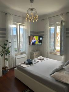 Posteľ alebo postele v izbe v ubytovaní Villa Istriana