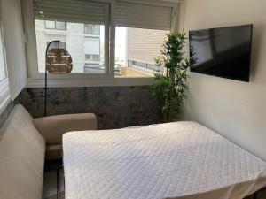 TV a/nebo společenská místnost v ubytování Apartamento con ubicación TOP