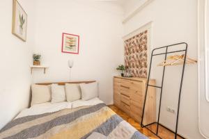 Posteľ alebo postele v izbe v ubytovaní Gellerico Rooms at Horánszky Street