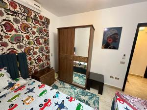 Postel nebo postele na pokoji v ubytování بلومار Blumar
