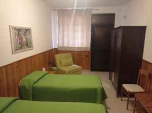 Letto o letti in una camera di Albergo Brioschi