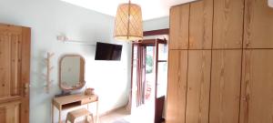 A television and/or entertainment centre at Nostra Casa di Hovolo