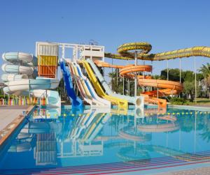a water park with a water slide and slides at One Resort Aqua Park in Monastir +83 photos