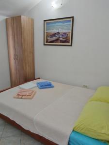 Postel nebo postele na pokoji v ubytování Apartmanes Volaric M