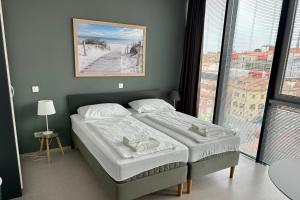 Postel nebo postele na pokoji v ubytování Hostel Villa Domus