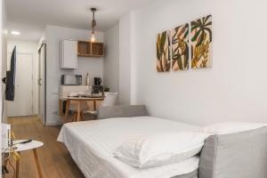 Postel nebo postele na pokoji v ubytování Nomad, Wifi , Espacio trabajo ,Playa ,Ocio