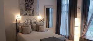 Una cama o camas en una habitación de Carducci