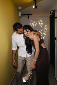a man and woman posing for a picture at a party at AIRIO Athens Luxury Suites in Athens +47 photos