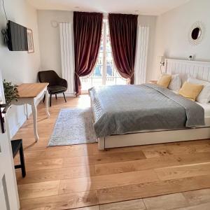 Ένα ή περισσότερα κρεβάτια σε δωμάτιο στο Experiential Lodge Rooms