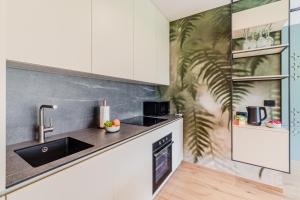 Kuchyň nebo kuchyňský kout v ubytování Apartment Hajdi with Sauna & Garage + 37 fotografií