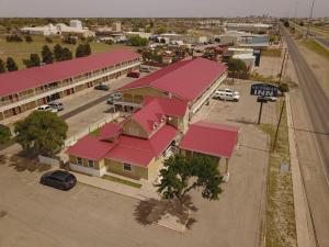 an overhead view of a small town with red roofs at Victorian Inn Midland in Midland