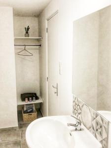 Ένα ή περισσότερα κρεβάτια σε δωμάτιο στο Chambre avec entrée indépendante à La Canourgue