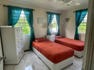 Postel nebo postele na pokoji v ubytování Valley View Apartment