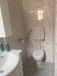 Koupelna v ubytování Apartments B&B + 29 fotografií