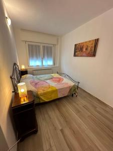 Giường trong phòng chung tại Borgo nel Vigneto